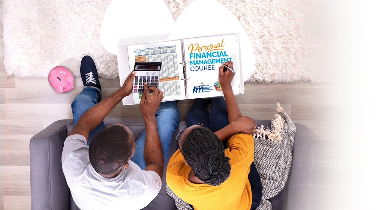 two people working with a calculator and the course book